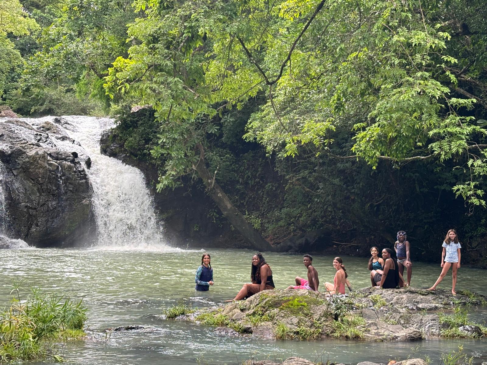 Children at a waterfall in Panama Family adventure vacation with Istmo in Panama