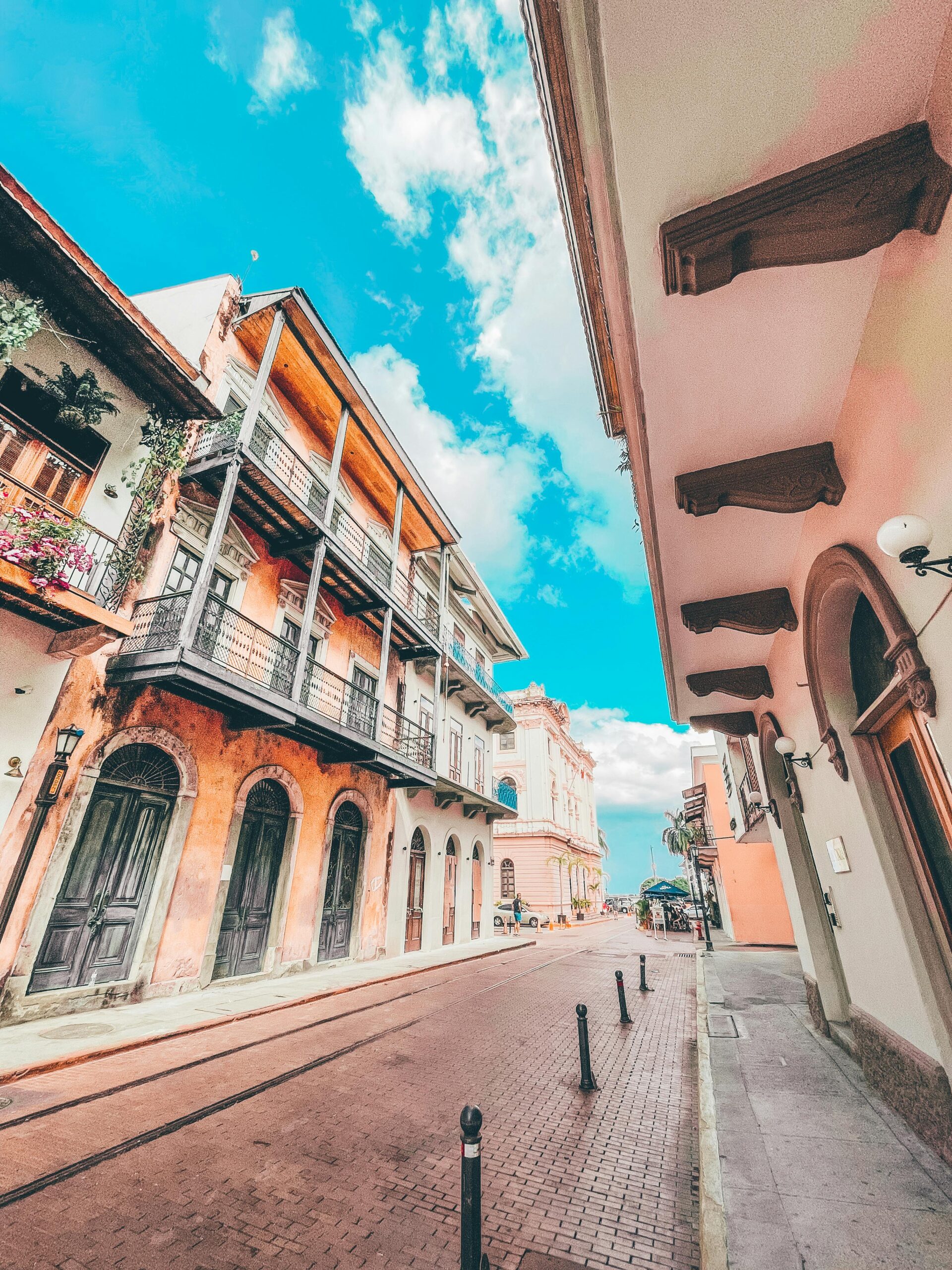 Historic colorful buildings in Casco Viejo, Panama City, with clear blue sky and charming cobblestone streets. Photo by Luis Quintero Historic colorful buildings in Casco Viejo, Panama City, with clear blue sky and charming cobblestone streets. Photo by Luis Quintero